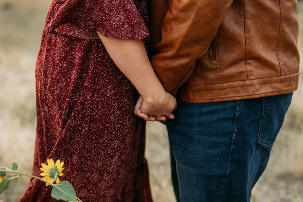 Couple holding hands to show their kids marriage matters.