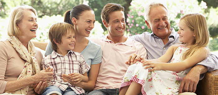 In-laws - three generations laughing together.